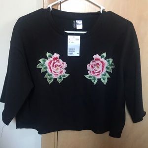 Women’s size small cropped flower crew neck